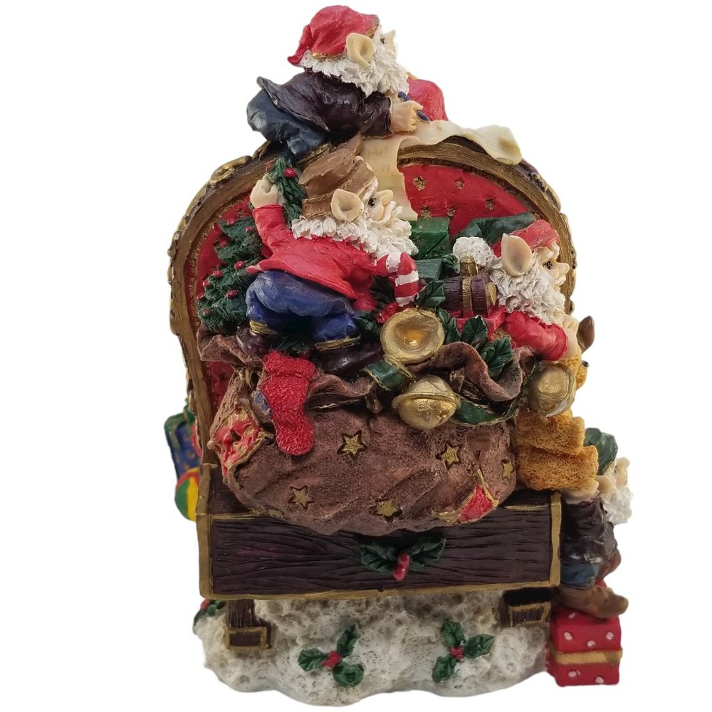 Santa in a Red Sleight Bed Resin Holiday Décor with Elves, Presents, And Toys - Picture 3 of 15